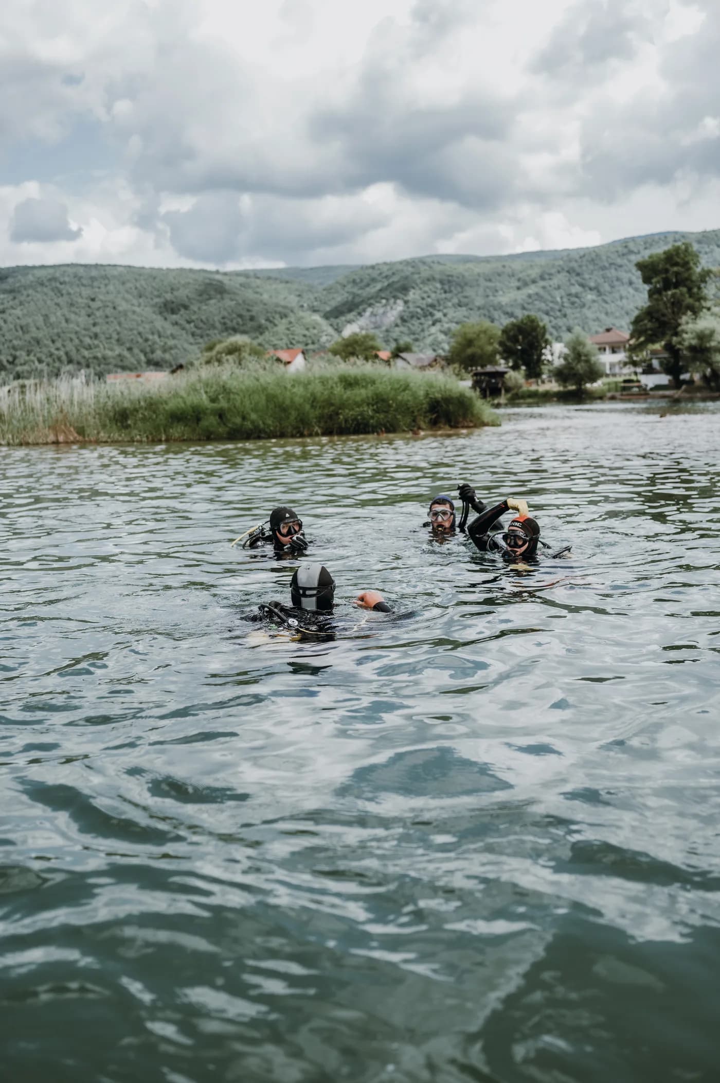 Four divers surfaced in the Una River during the cleanup action.