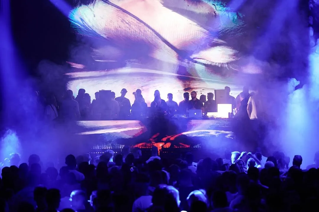 DJ booth and crowd at UNITY